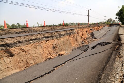 The image shows a road that was destroyed by an earthquake.